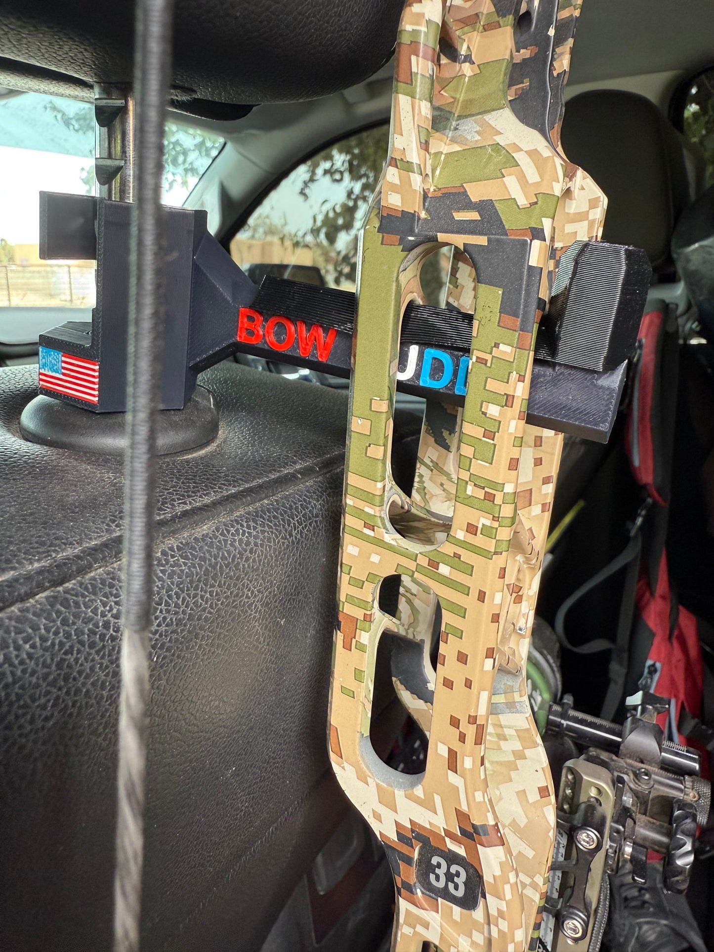 Twist-On Bow Buddy - Nearly Universal Archery Bow and Gear Hanger for Trucks & SUVs - Rubber Protector and Spacer Ring Included | Made in USA | Quick No-Tool Install