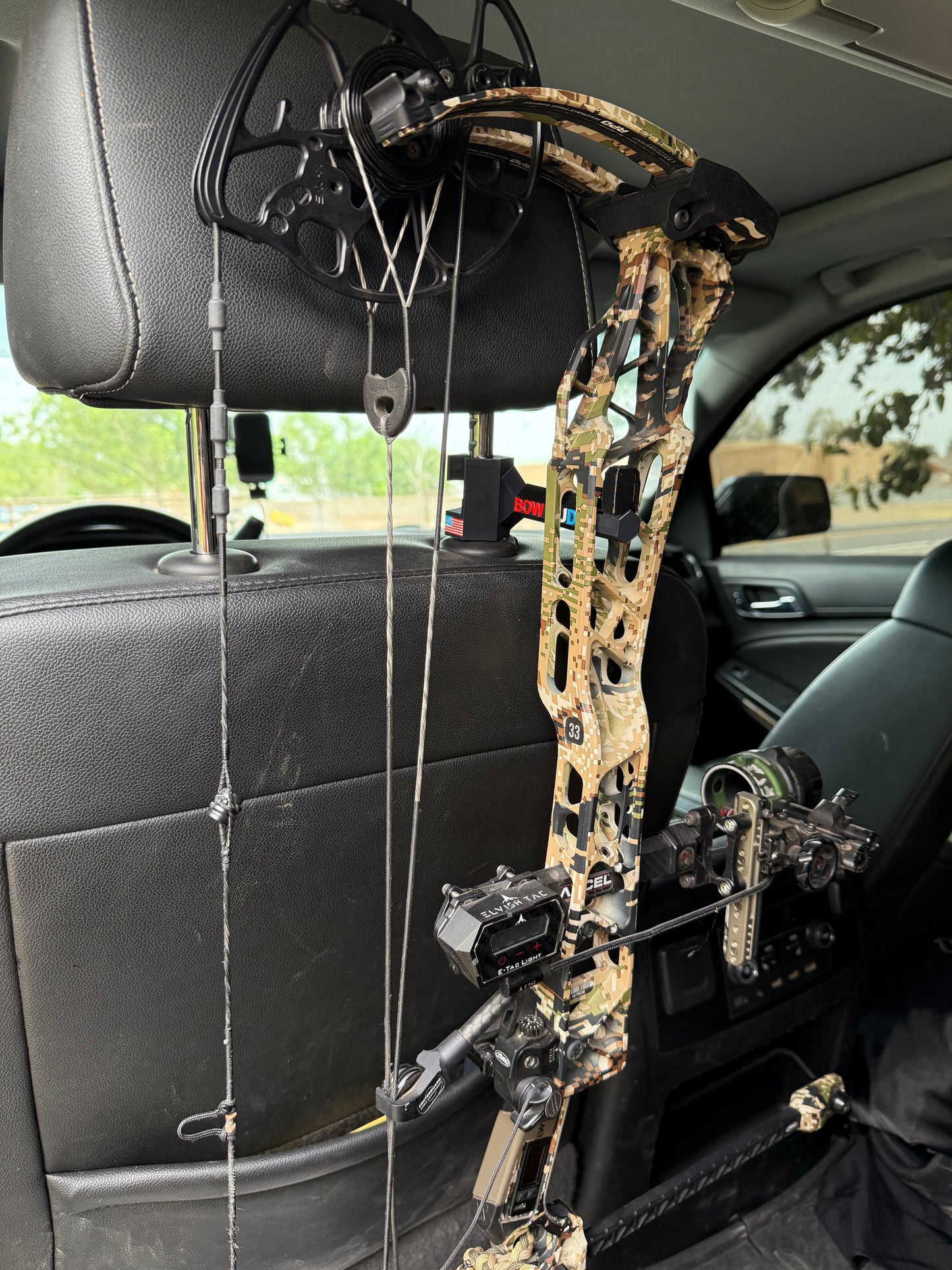 Twist-On Bow Buddy - Nearly Universal Archery Bow and Gear Hanger for Trucks & SUVs - Rubber Protector and Spacer Ring Included | Made in USA | Quick No-Tool Install