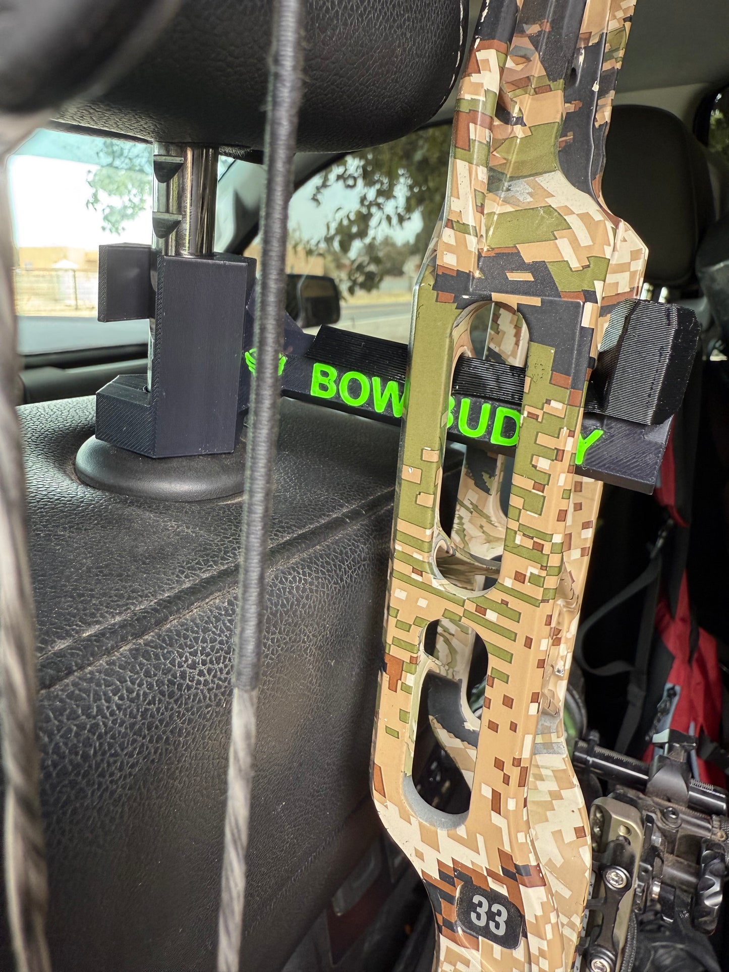 Twist-On Bow Buddy - Nearly Universal Archery Bow and Gear Hanger for Trucks & SUVs - Rubber Protector and Spacer Ring Included | Made in USA | Quick No-Tool Install