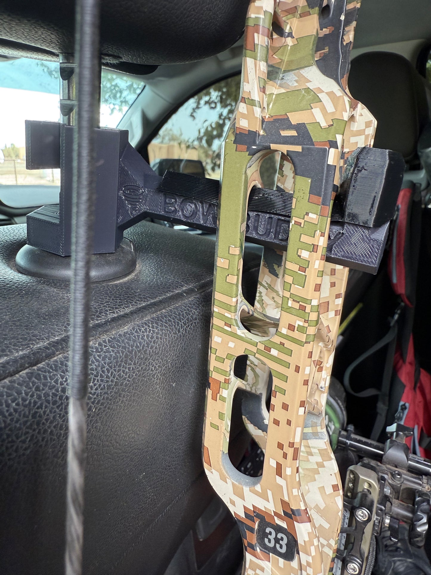 Twist-On Bow Buddy - Nearly Universal Archery Bow and Gear Hanger for Trucks & SUVs - Rubber Protector and Spacer Ring Included | Made in USA | Quick No-Tool Install